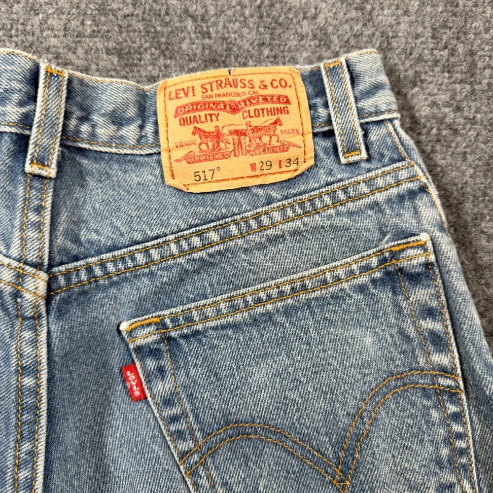 Levi's 517 Boot Cut Jeans Mens 29x34 Fit 27x31 Blue Distressed Frayed Denim Hem